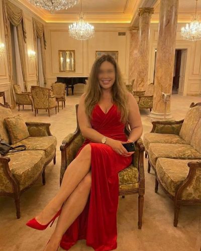 Bbrrolyn busty  British blonde in a red  dress